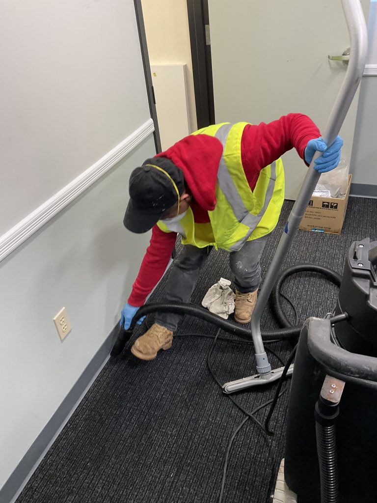 cleaning in protective gear